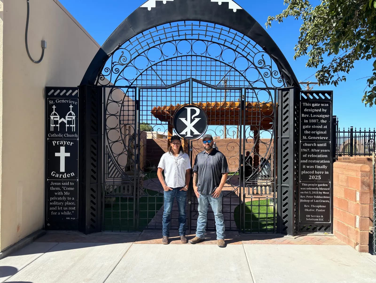 Arched iron prayer-garden gate built for a Las Cruces Catholic church